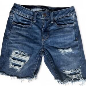 American Eagle Mid Rise Distressed denim shorts with ripped details size 4‎